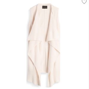 Cream sleeveless cardigan